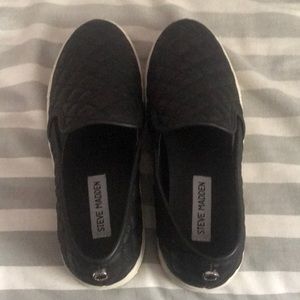 Never worn Steve Madden black slip on shoes 8.5